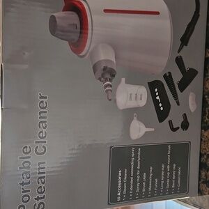 Brand New Never Opened Portable Steam Cleaner